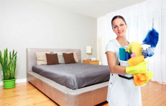 Woman cleaning room